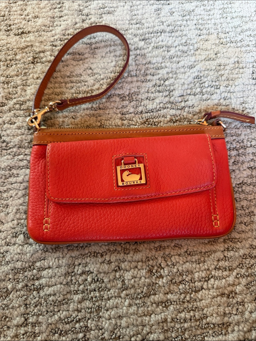 Dooney & Bourke Orange Pebble Leather Wristlet with Tan Trim